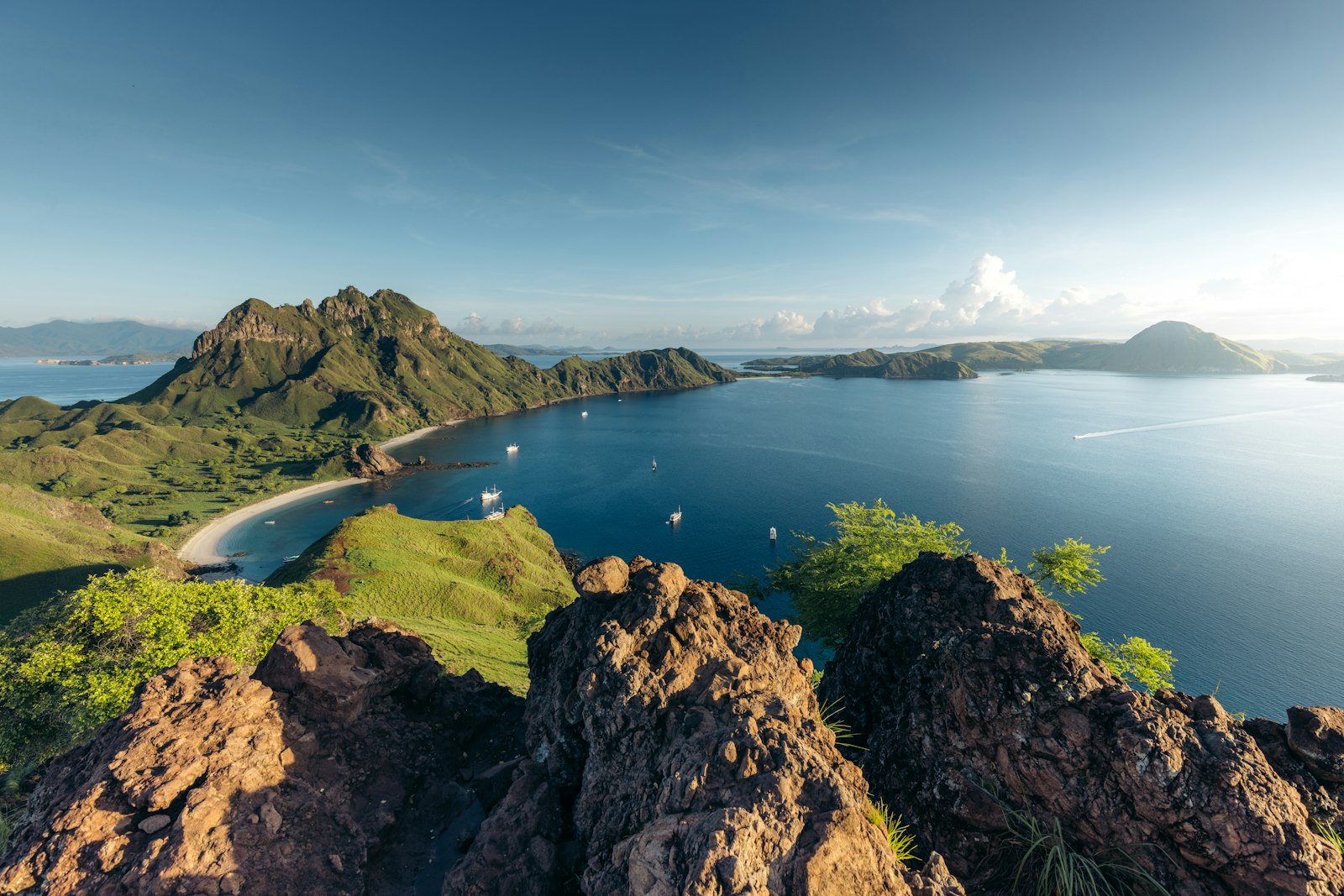 A panoramic view of a lake and mountains